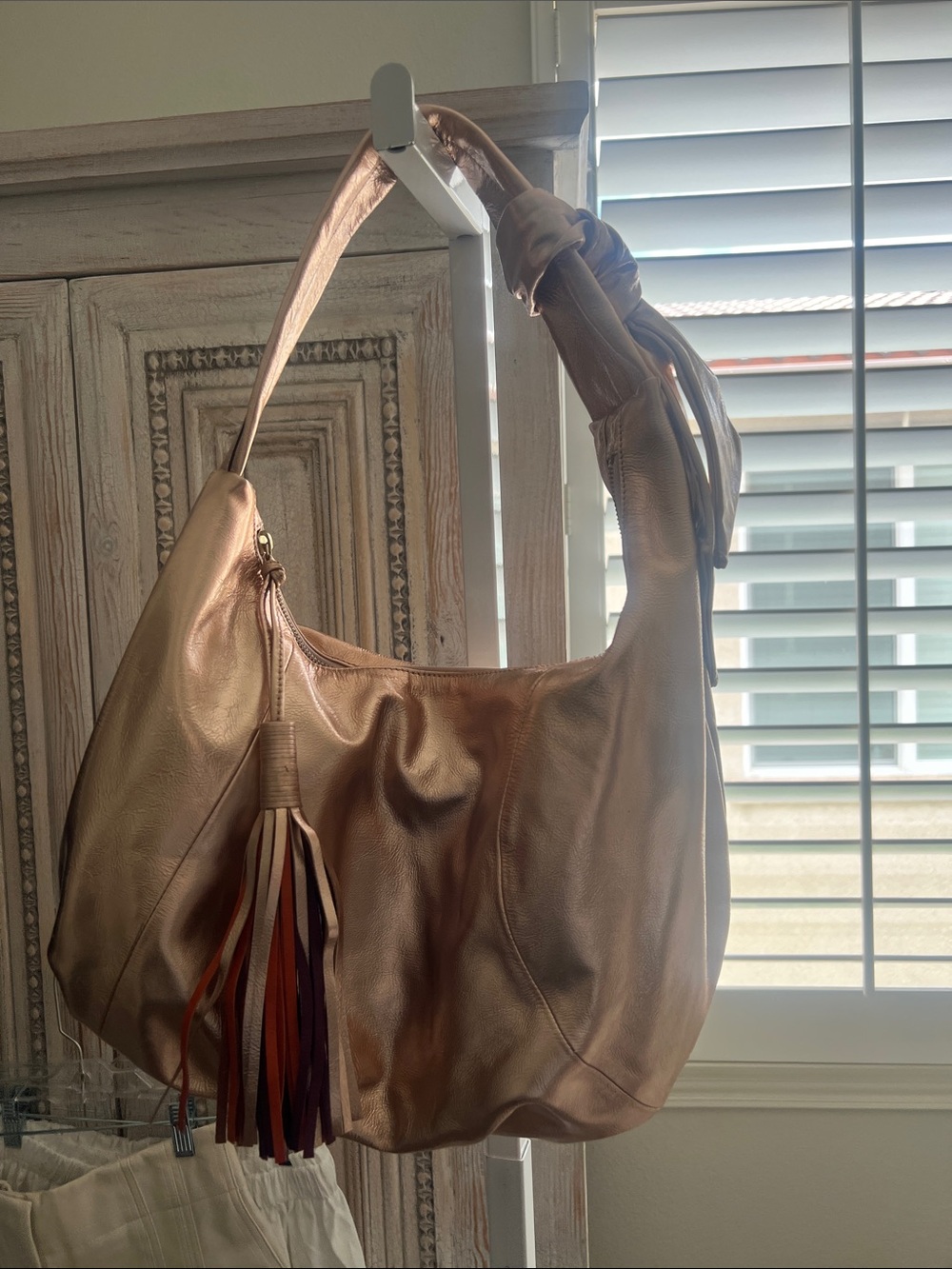 Womens Metallic Rose Gold Hobo Bag with Tassel